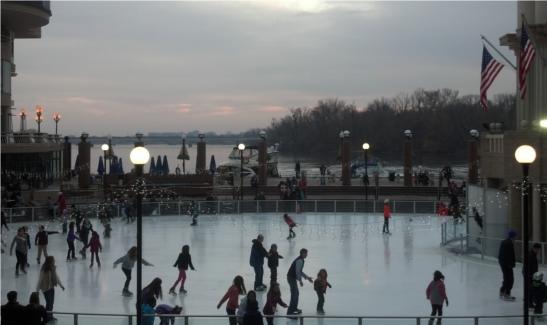Ice skaters at Georgetown waterfront, night